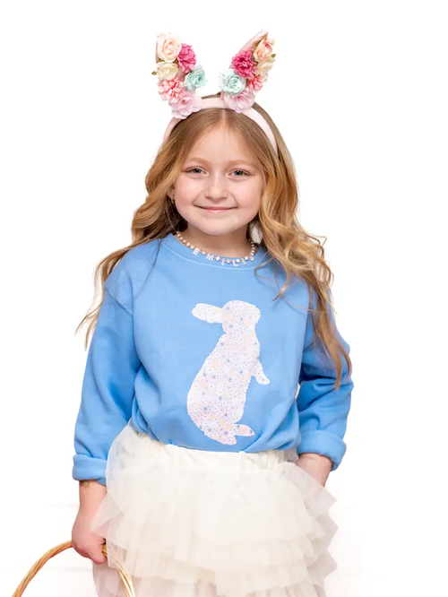 Toddler girl wearing blue Easter bunny sweatshirt, spring photo outfit idea for kids