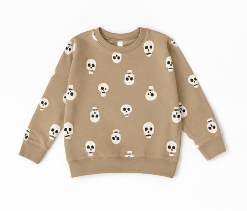 A beige crewneck sweatshirt with an all-over white skull and crossbones pattern, laid flat on a white background.