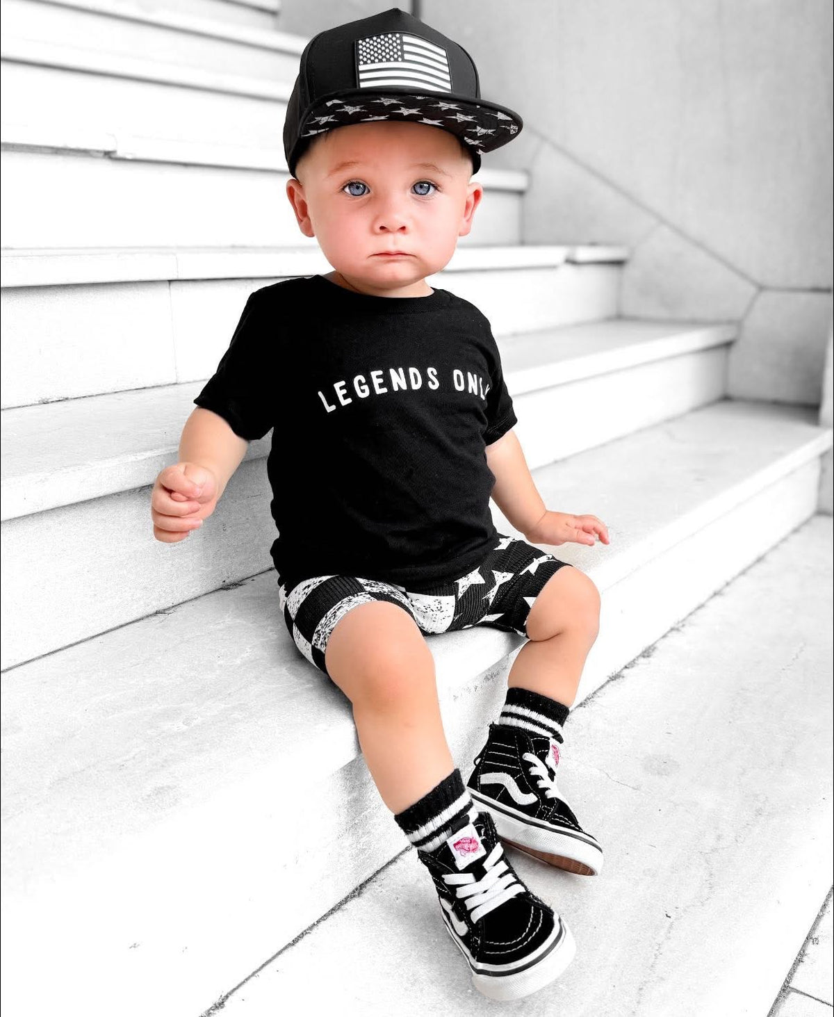 Toddler boy wearing Legends Only trendy black graphic tee